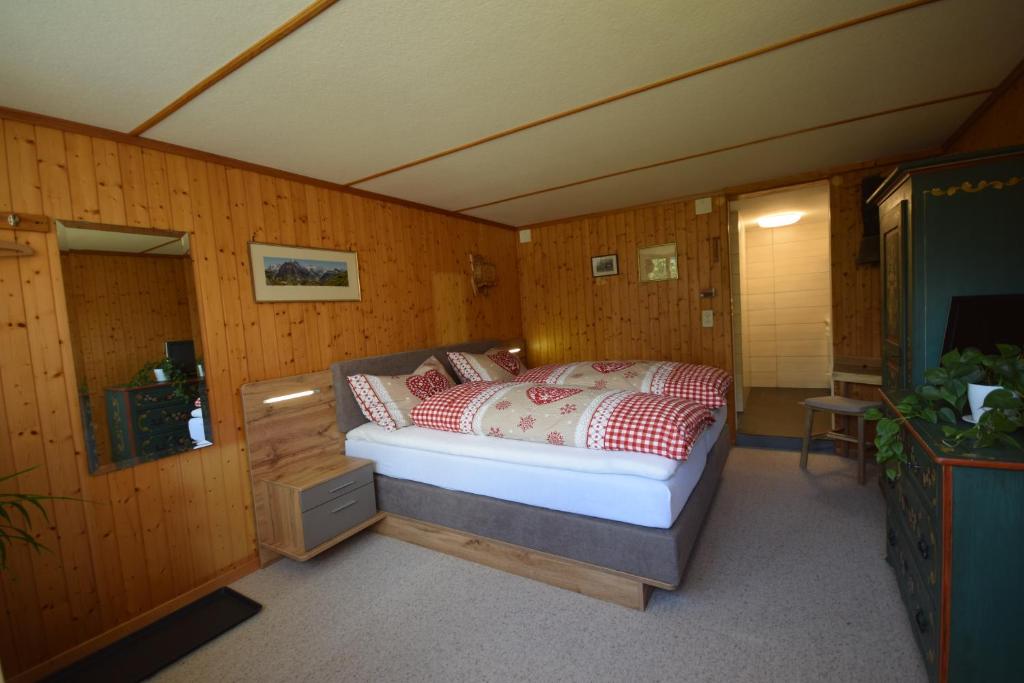 Postel nebo postele na pokoji v ubytování Studio bim Chalet bim Chilchli