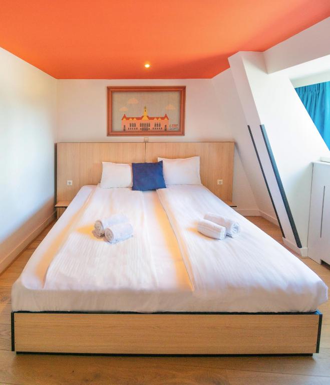 Cama o camas de una habitación en Sparks Hostel