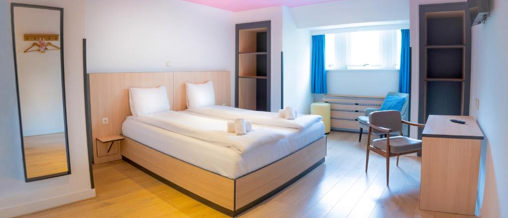 Cama o camas de una habitación en Sparks Hostel