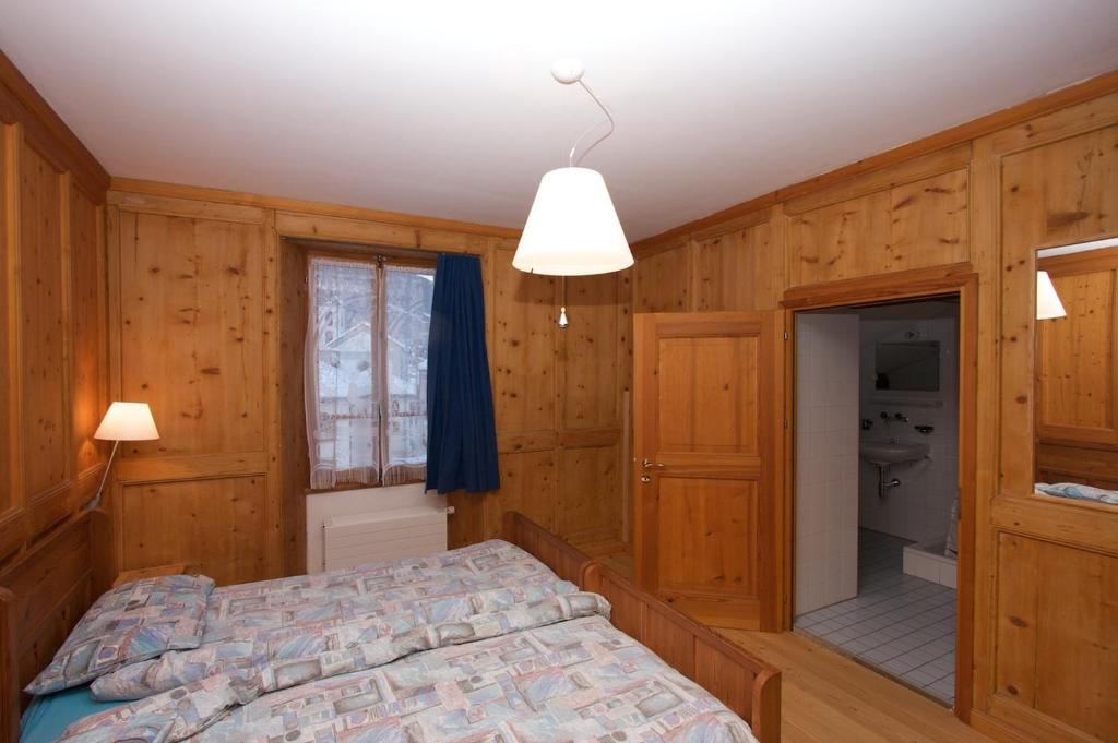Postel nebo postele na pokoji v ubytování Hotel La Cascata