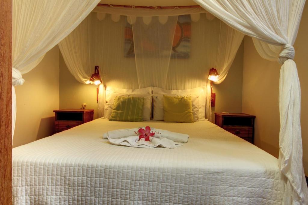 Cama ou camas em um quarto em Pousada Vila Boa Vida
