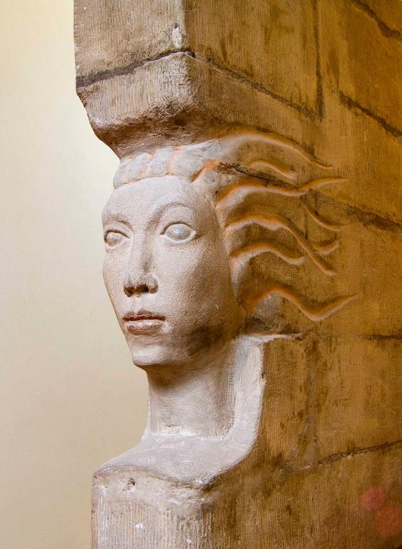 a statue of a head on a wall at Hotel d'Allèves in Geneva