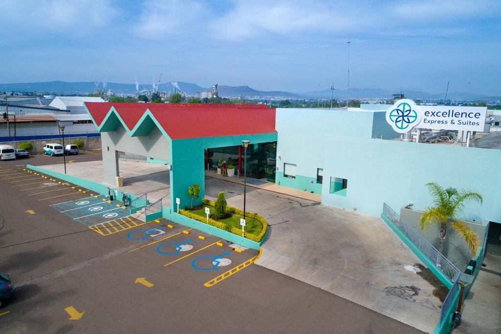 an exterior view of a gas station at Excellence Express & Suites in San Juan del Río