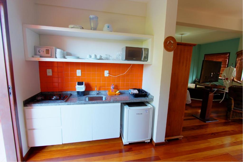 A cozinha ou cozinha compacta de Pousada Vila Boa Vida