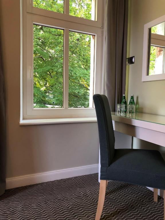 Posezení v ubytování CIENISTA 7 APARTMENTS