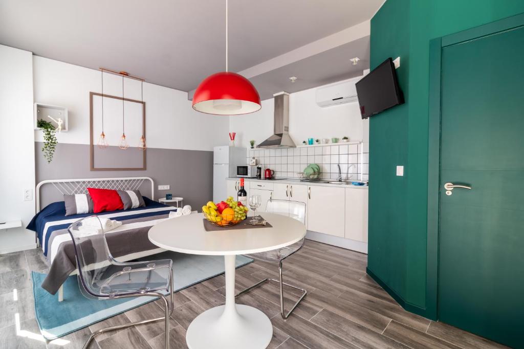 Kuchyň nebo kuchyňský kout v ubytování Apartamentos Navío