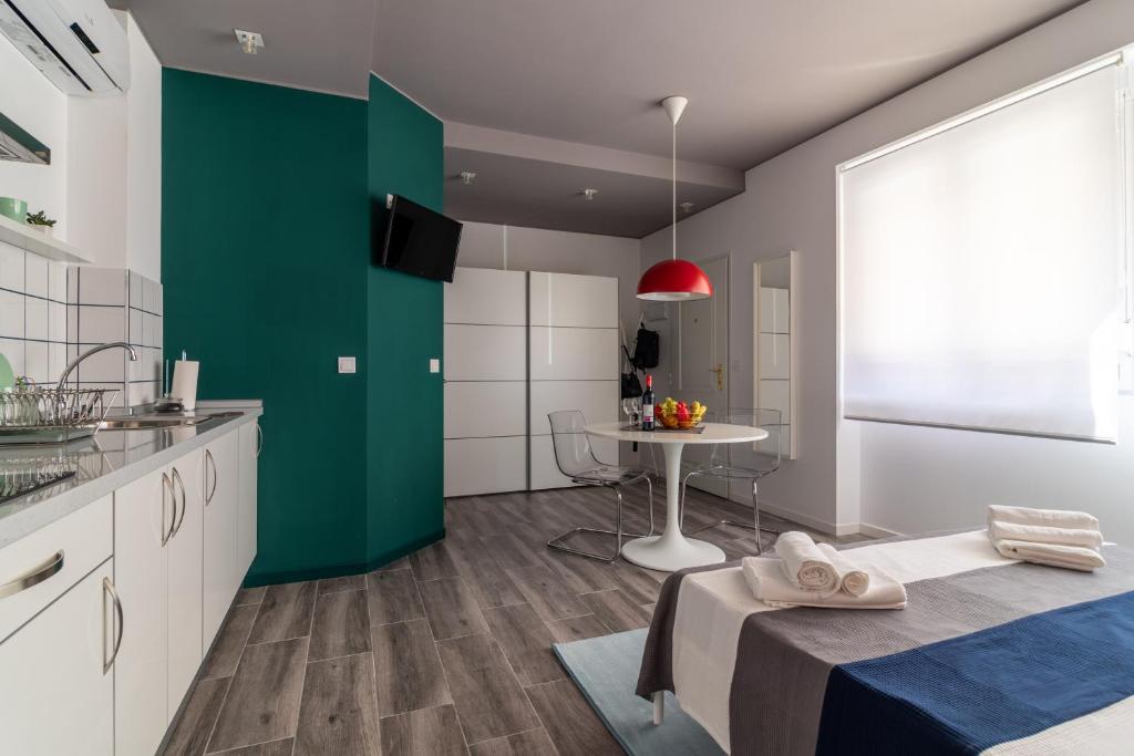 Kuchyň nebo kuchyňský kout v ubytování Apartamentos Navío