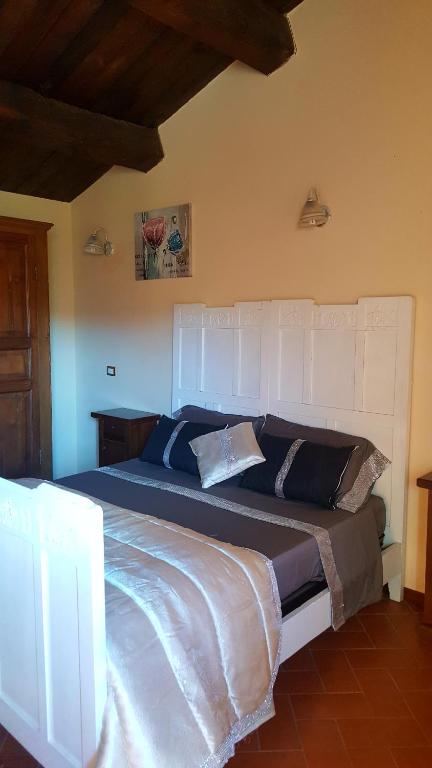 A bed or beds in a room at Posto del Sole