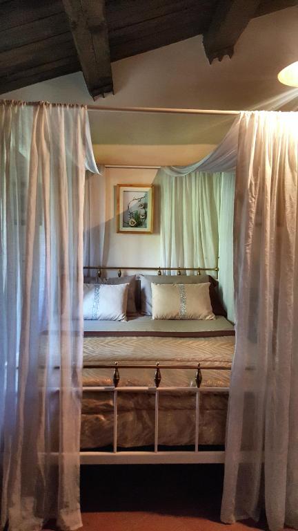 A bed or beds in a room at Posto del Sole