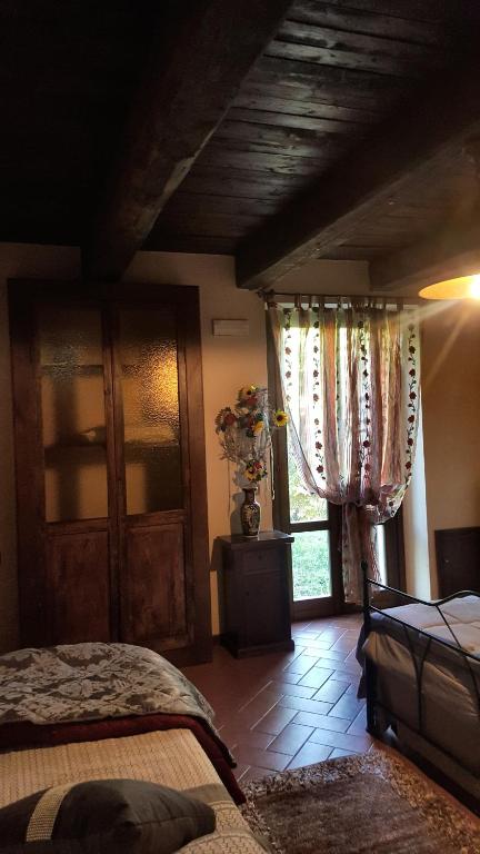 A bed or beds in a room at Posto del Sole