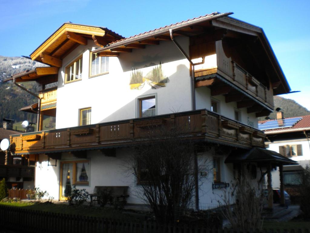a large white building with a balcony on it at Haus Schiestl in Zell am Ziller