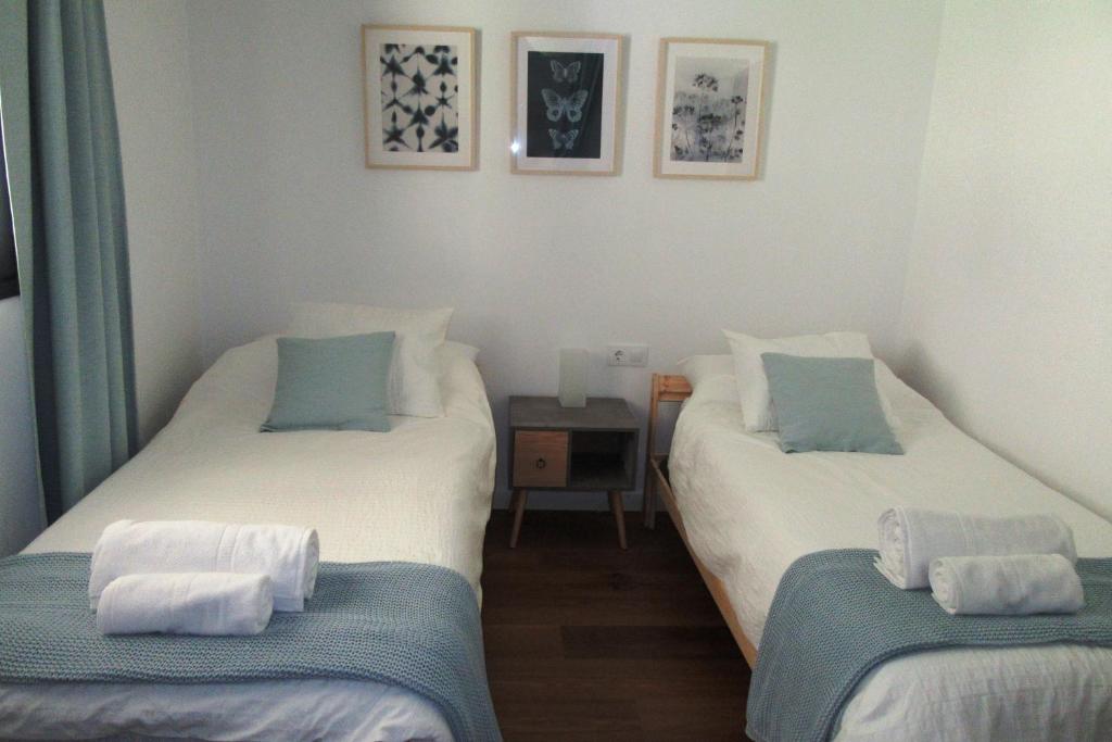Postel nebo postele na pokoji v ubytování Vivienda Rural Olivar del Chanza