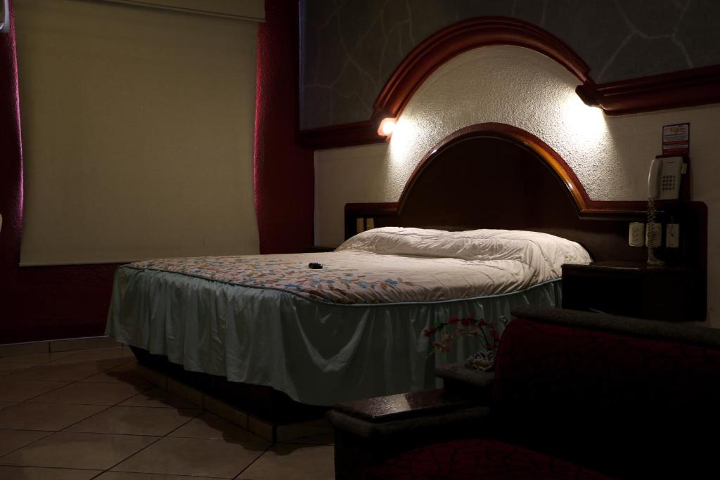 Postel nebo postele na pokoji v ubytování Motel Caribe