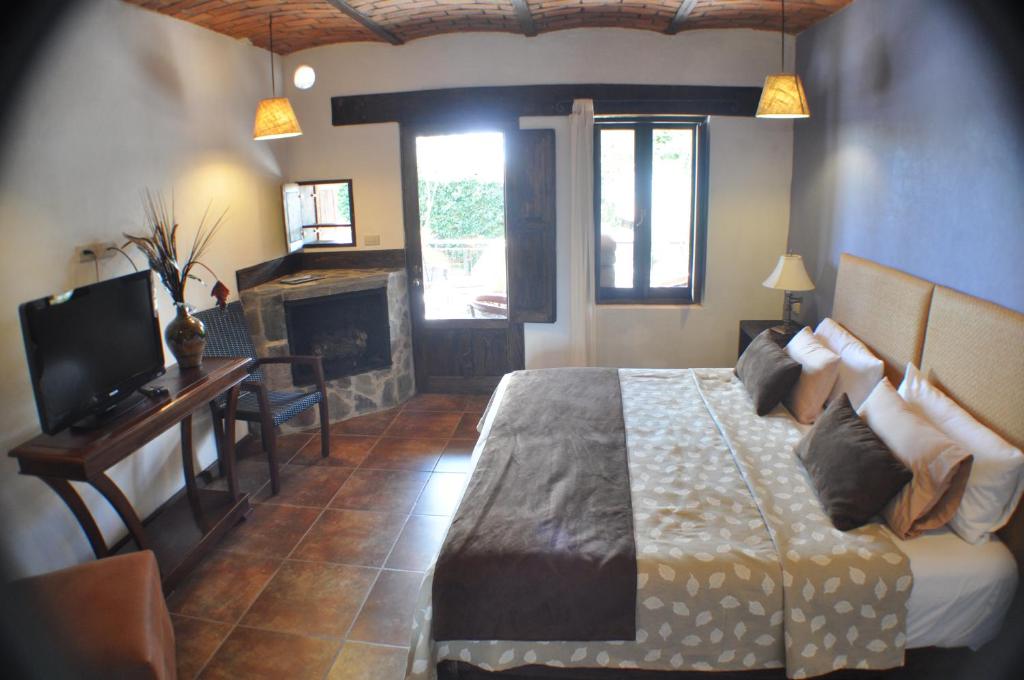 TV a/nebo společenská místnost v ubytování Hotel Villa Cassis