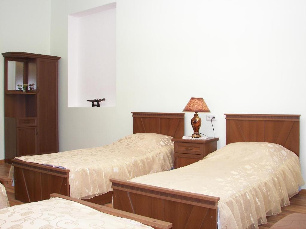 Postel nebo postele na pokoji v ubytování Hotel MIRA
