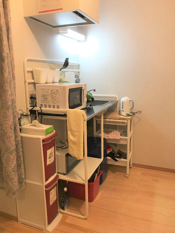 Kuchyň nebo kuchyňský kout v ubytování Sadie's Home