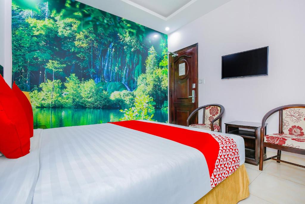 Postel nebo postele na pokoji v ubytování Areca Riverside Đà Nẵng