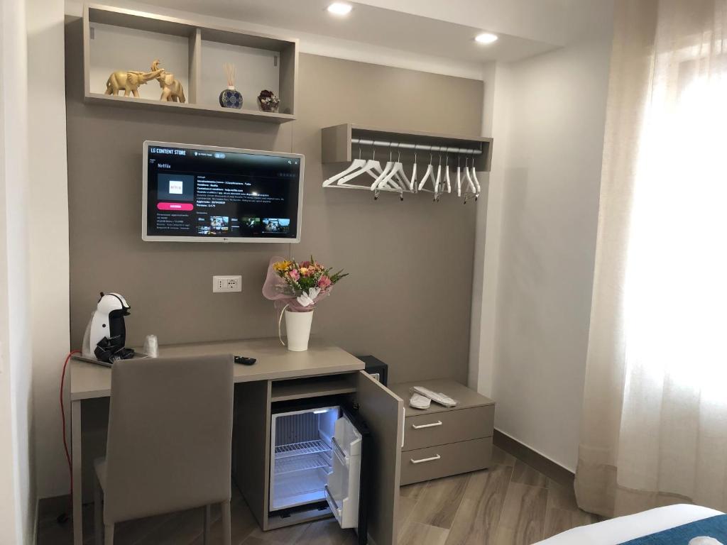 TV a/nebo společenská místnost v ubytování Le Muse Suite