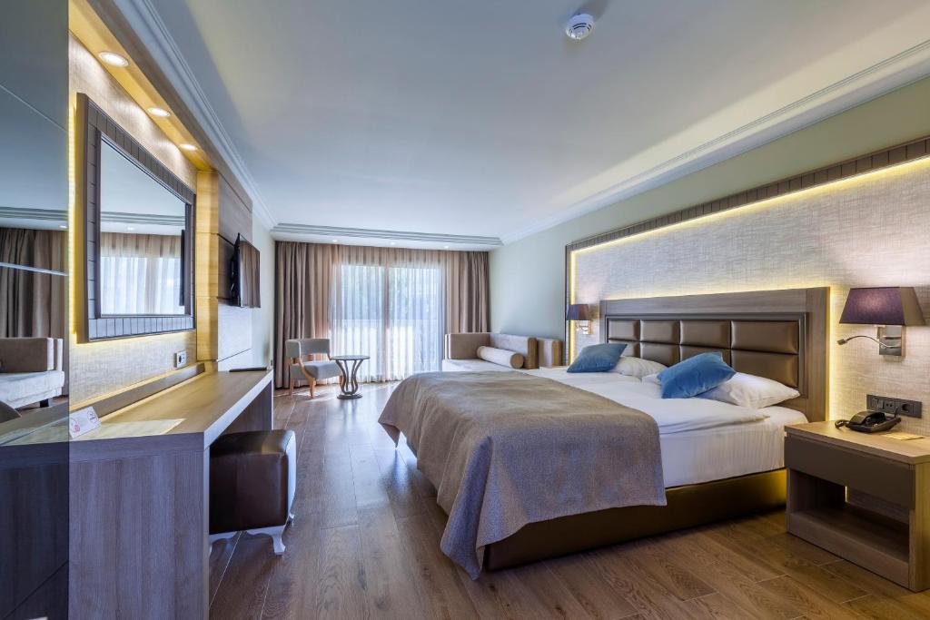 Postel nebo postele na pokoji v ubytování Samara Hotel Bodrum Ultra All Inclusive