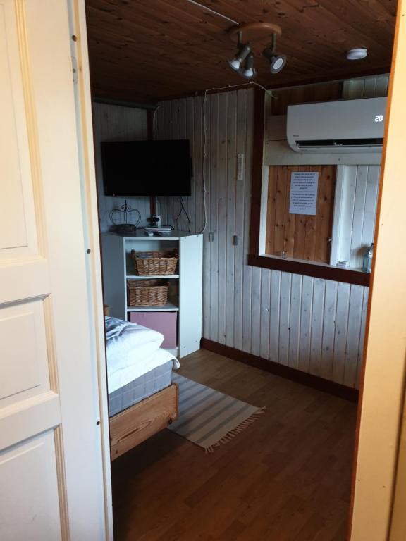 Kuchyň nebo kuchyňský kout v ubytování Örnatorpet Ullared
