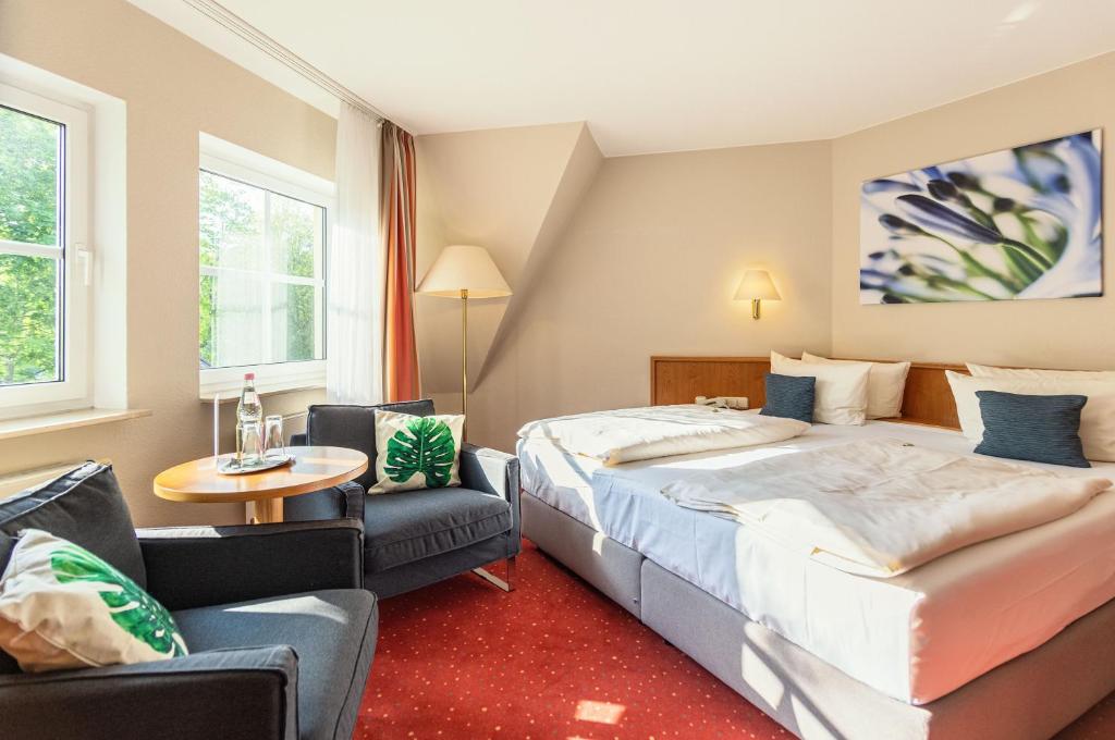 Postel nebo postele na pokoji v ubytování Parkhotel Diani