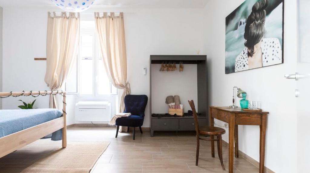 A bed or beds in a room at Casa Otto