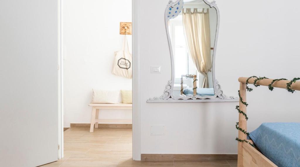 A bed or beds in a room at Casa Otto