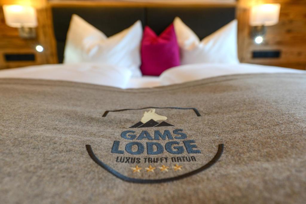 Llit o llits en una habitació de Gams Lodge