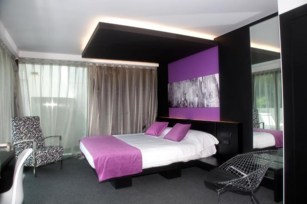 Postel nebo postele na pokoji v ubytování Hotel Playa Ribera