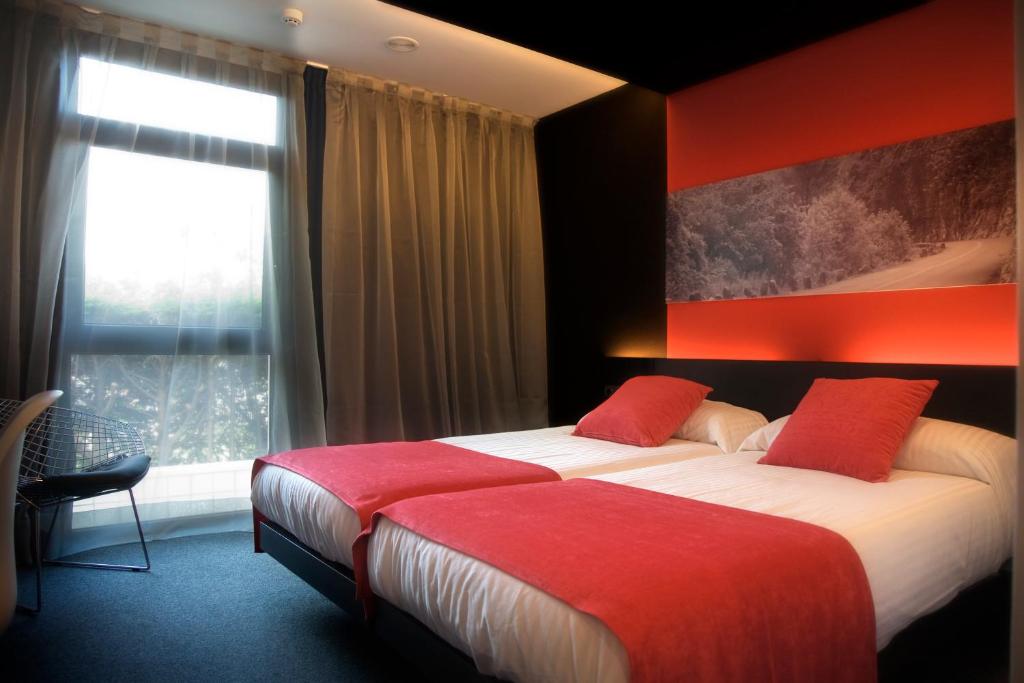 Postel nebo postele na pokoji v ubytování Hotel Playa Ribera