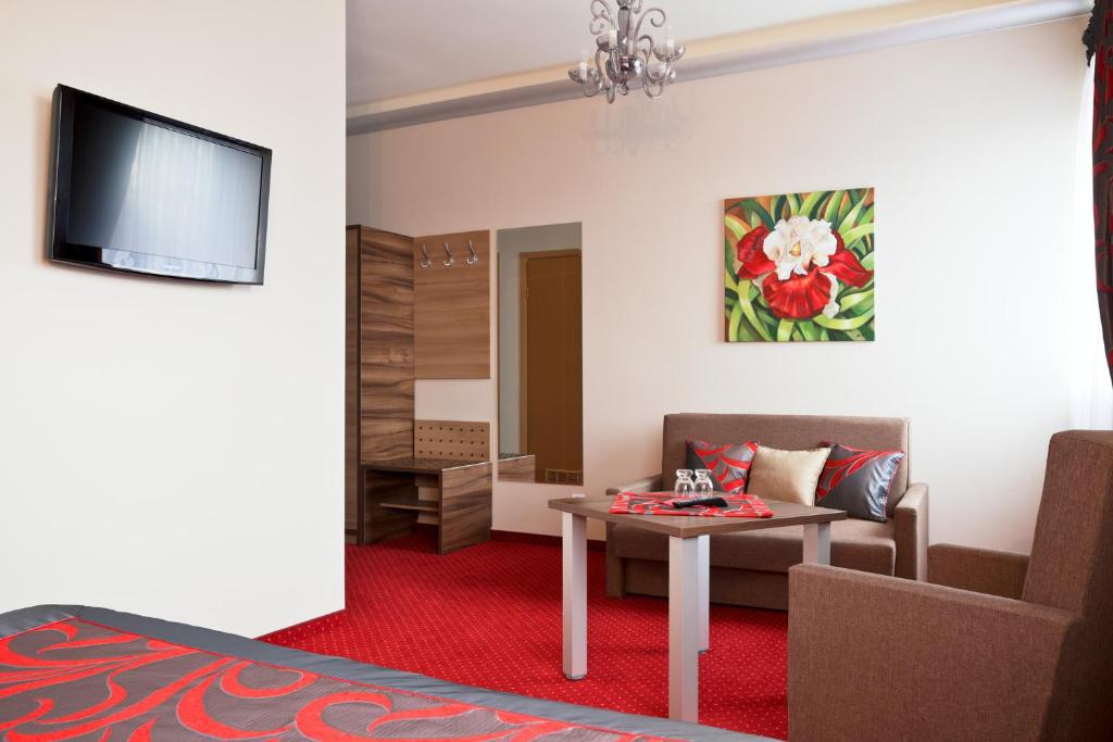 TV a/nebo společenská místnost v ubytování Hotel Politański