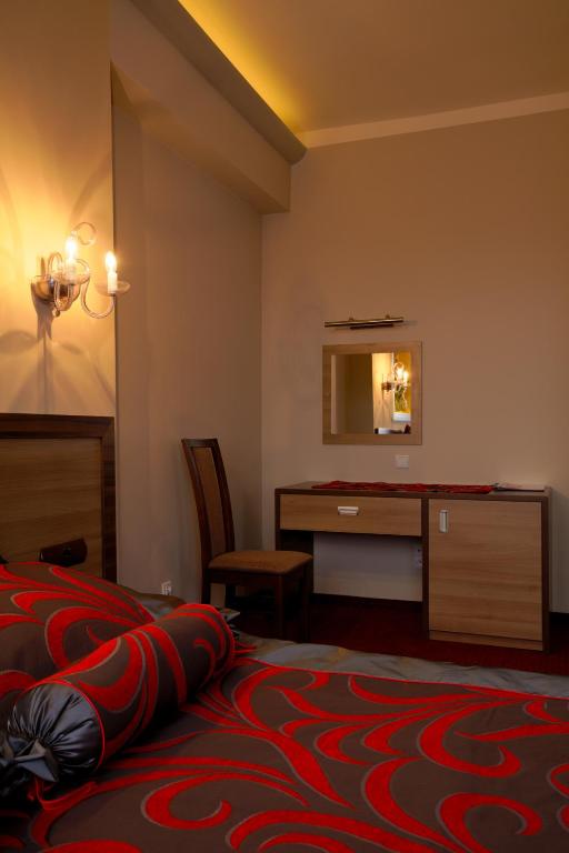 Postel nebo postele na pokoji v ubytování Hotel Politański