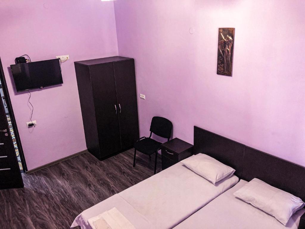 Postel nebo postele na pokoji v ubytování Hotel Victoria