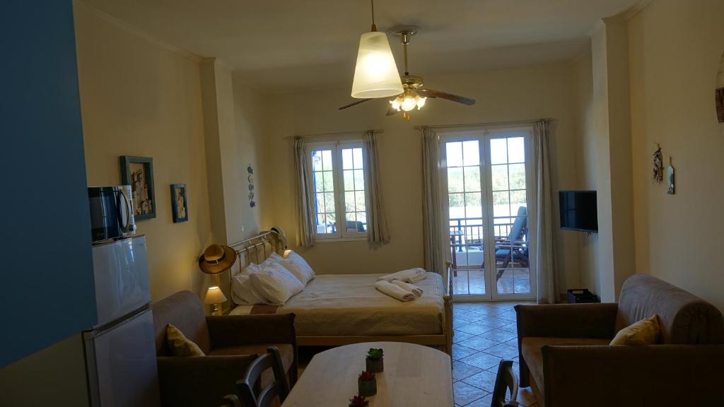 Postel nebo postele na pokoji v ubytování Sea Urchin Apartments 1st floor