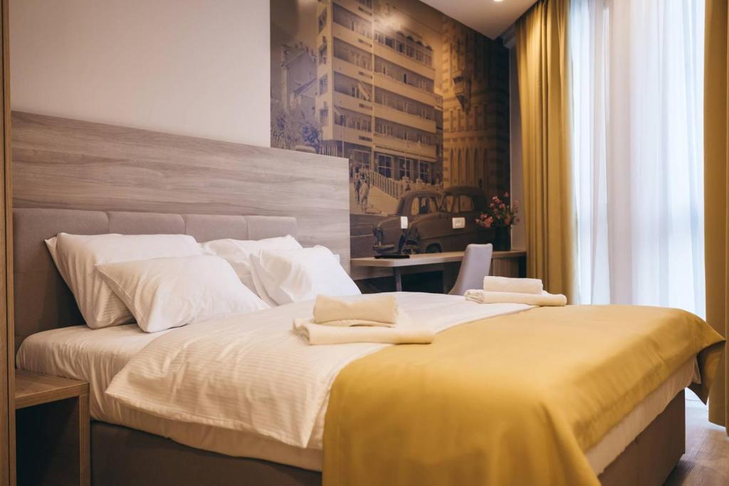 Postel nebo postele na pokoji v ubytování Hotel Verso