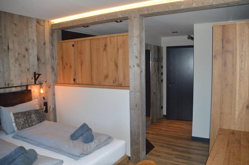 Postel nebo postele na pokoji v ubytování Herz3 Hotel Bar Restaurant Trattoria