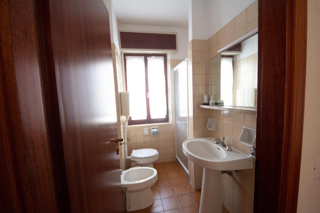 Koupelna v ubytování Hotel Calipso