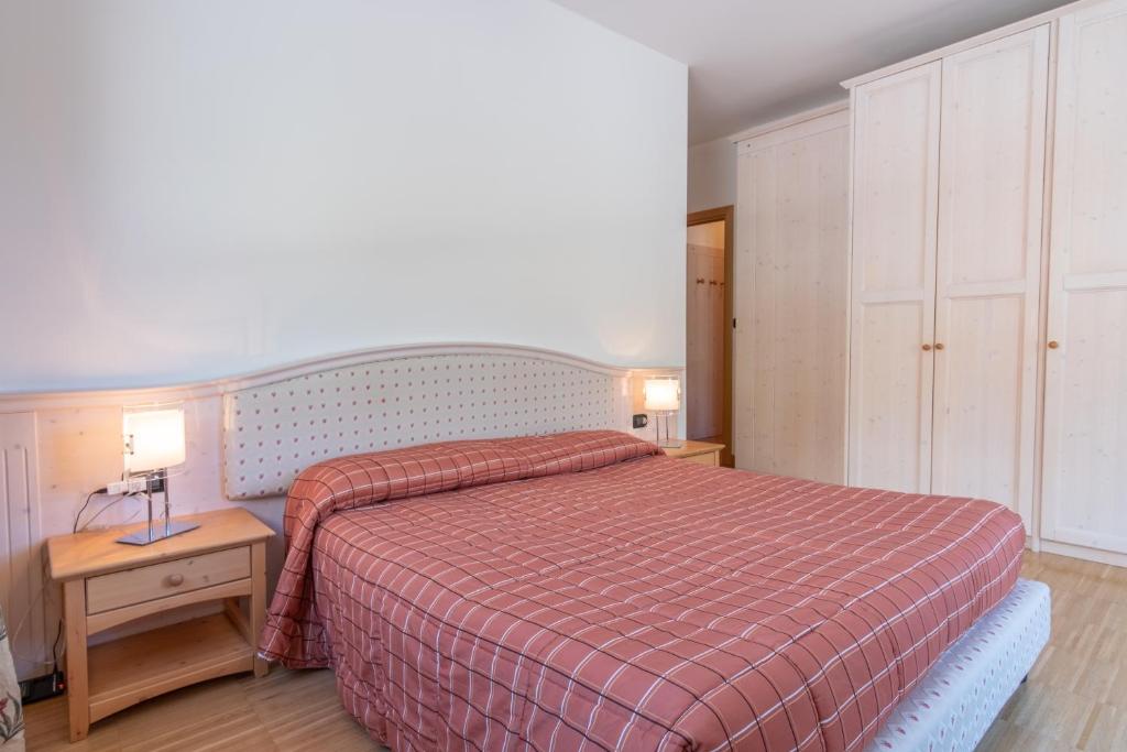 Posteľ alebo postele v izbe v ubytovaní Monte Cervino Apartment AS21