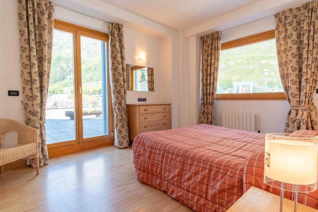 Posteľ alebo postele v izbe v ubytovaní Monte Cervino Apartment AS21