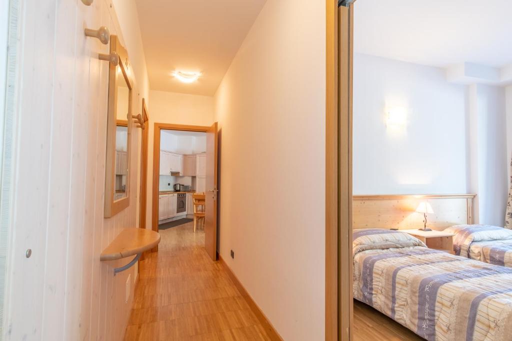 Posteľ alebo postele v izbe v ubytovaní Monte Cervino Apartment AS21