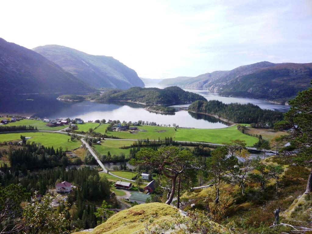 a view of a valley with a river and mountains at Tosbotn Camping & Cottages in Tosbotnet