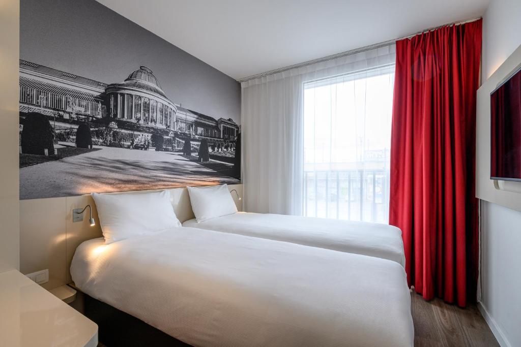 Postel nebo postele na pokoji v ubytování B&B HOTEL Brussels Centre Gare du Midi