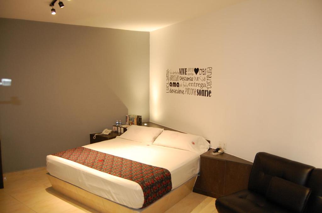 Postel nebo postele na pokoji v ubytování Hotel Dulce Boca