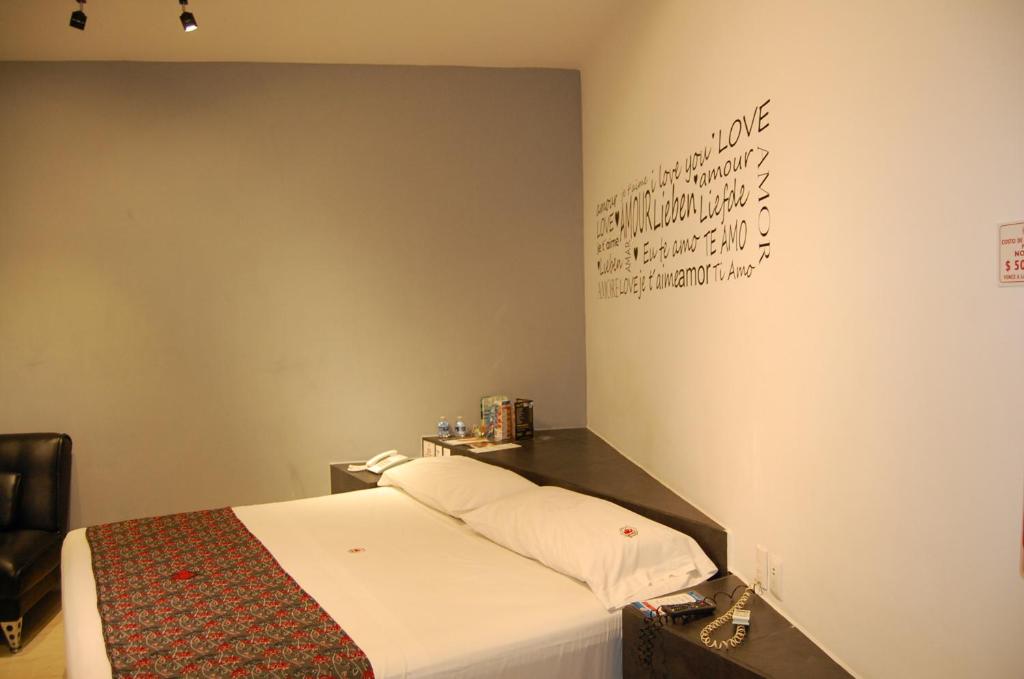 Postel nebo postele na pokoji v ubytování Hotel Dulce Boca