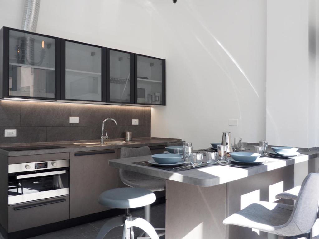 Kuchnia lub aneks kuchenny w obiekcie Pitti Apartment