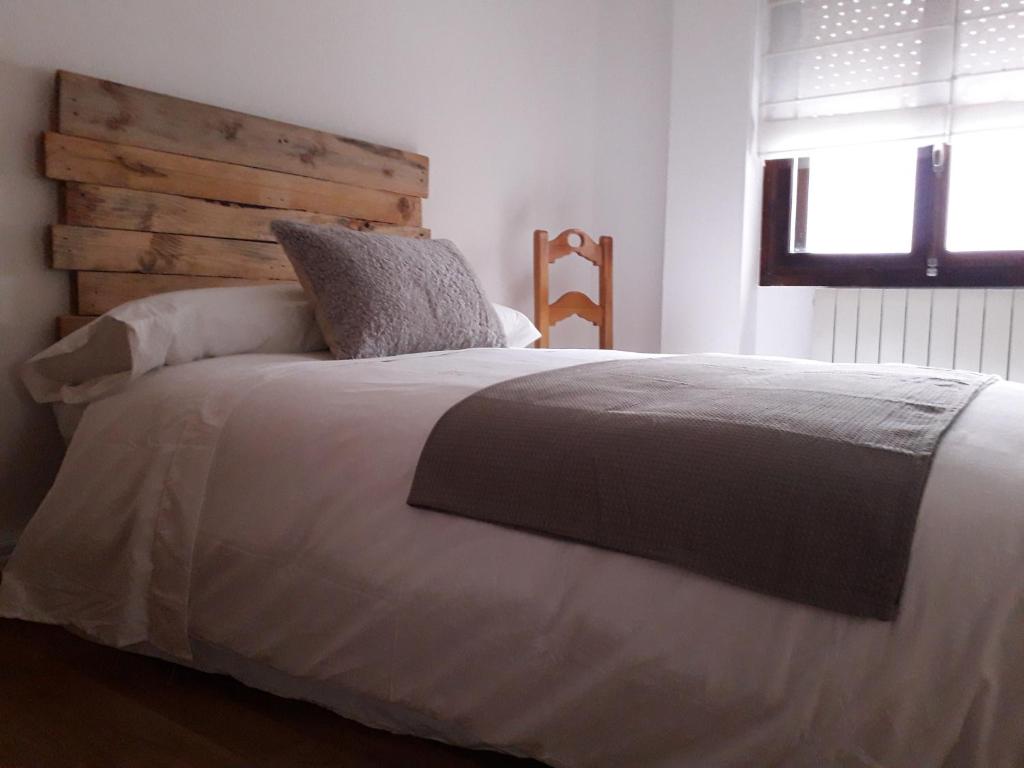 Postel nebo postele na pokoji v ubytování Piso María