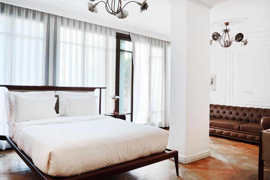 Postel nebo postele na pokoji v ubytování Georges Hotel Galata