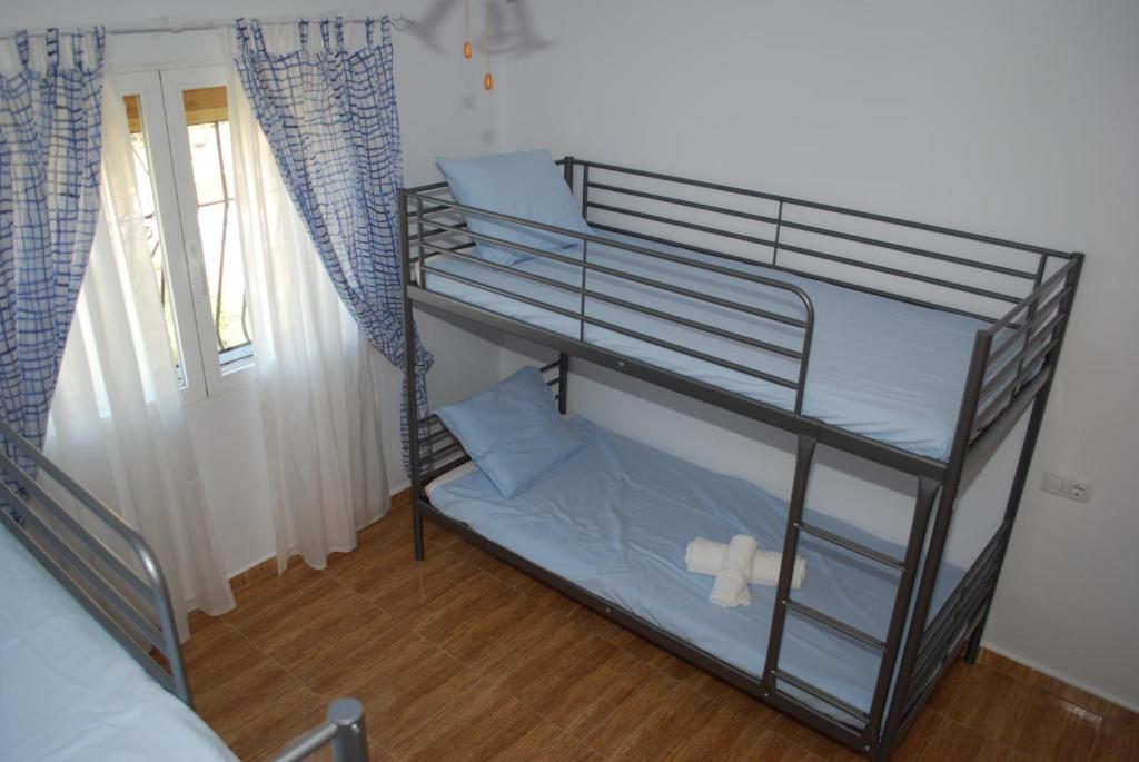 Postel nebo postele na pokoji v ubytování Villa Bello Horizonte
