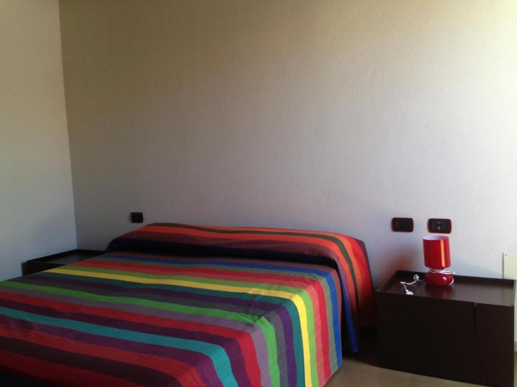 Łóżko lub łóżka w pokoju w obiekcie Lanita B&B