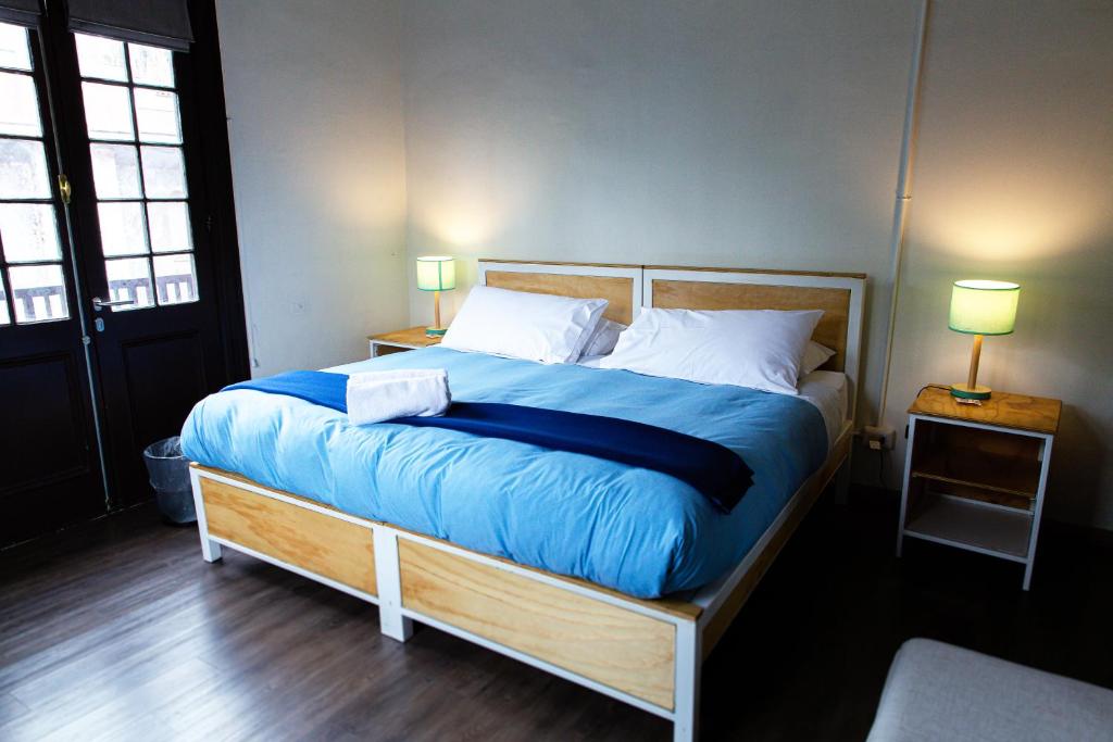 Postel nebo postele na pokoji v ubytování Pariwana Hostel Santiago